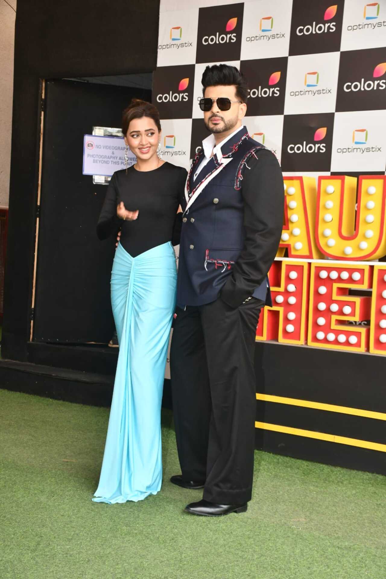 Tejasswi Prakash and Karan Kundrra were seen posing together on the sets of Laughter Chefs. Tejasswi Prakash and Karan Kundrra were seen posing together on the sets of Laughter Chefs.